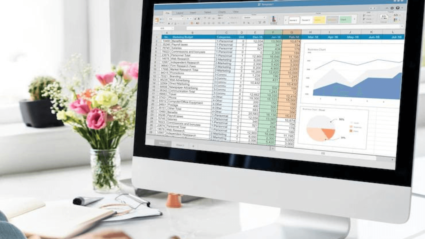 A product data entry expert entering data into spreadsheets
